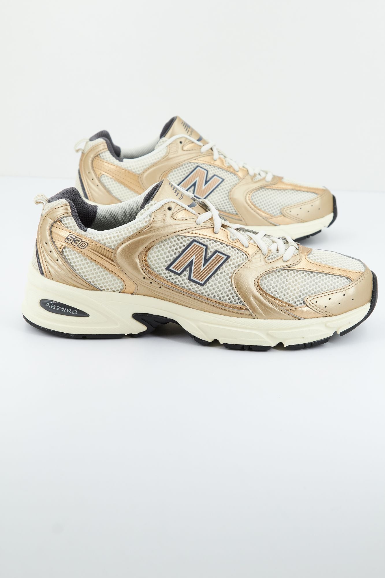 New balance sales hombre Oro